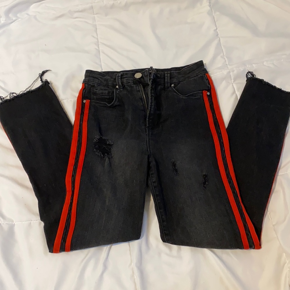 black skinny jeans with red side stripes